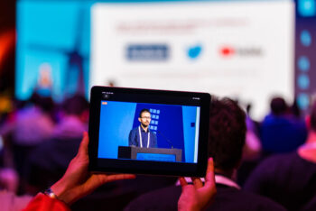 A hybrid event with live attendance and an online stream