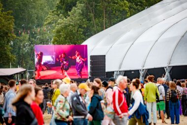 Outdoor screens also show the live act